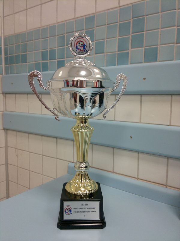 The 2012 IBSA European Championship trophy standing on a table.
